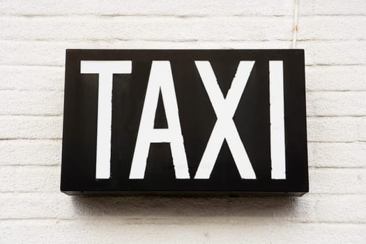 Taxi Sign on a wall