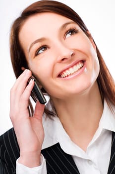 Attractive young woman calling by cellular phone