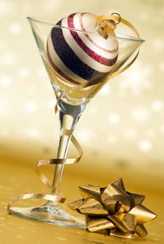 decorated glass with golden ornament close up