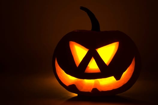 Halloween pumpkin on dark background close up shoot