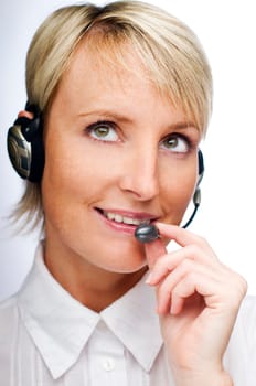 young blond woman with headset close up