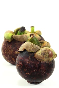 Fresh mangosteen against white background