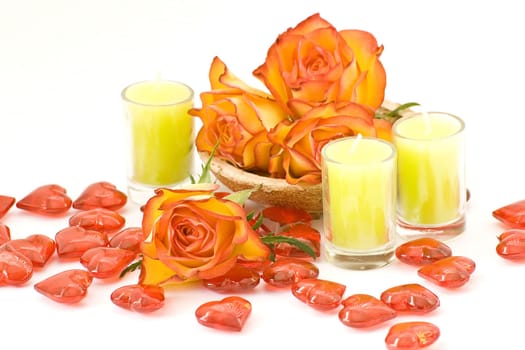 tea roses, candles and glass hearts