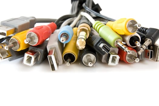 different cords and cables over a white background