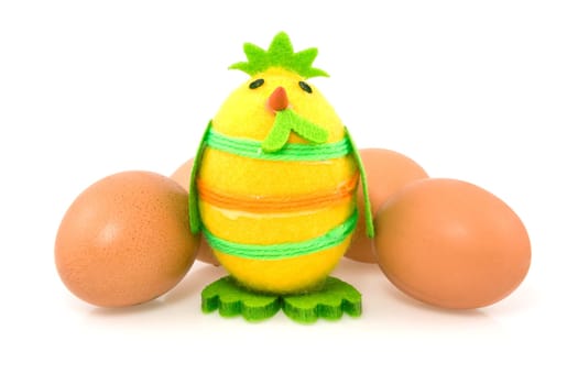 funny easter chick and brown eggs on white background