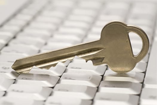 E-Learning Concept . silver key and Laptop computer