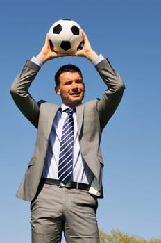 Business man coaching soccer