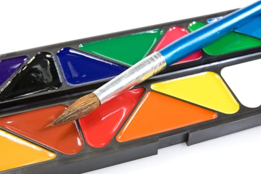 close up of water paint with brush