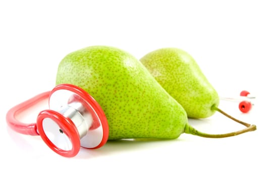 pears and stethoscope over a white background
