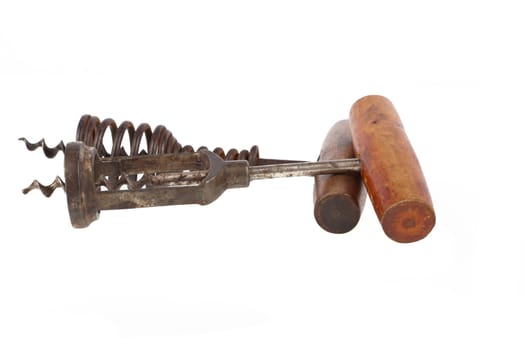Two older corkscrews against a white background