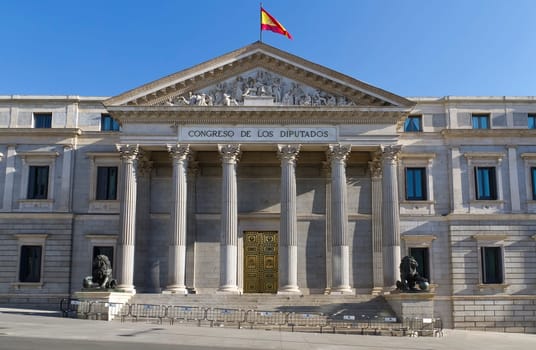 The sculpture of lion (1860) before the building of Spanish parliament in Madrid