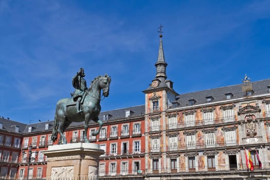 Statue of Philip III in foront of his house on Mayor plaza in the center of Madrid Spain