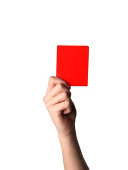 Hand holding up the Red Card isolated on white