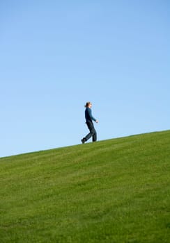Side view of a walking man