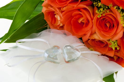 Jar with crystal heart-shaped on black background