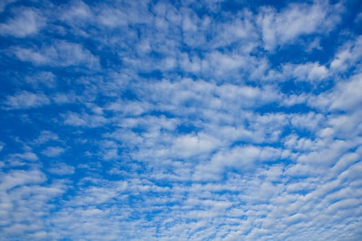 Blue sky with clouds full frame