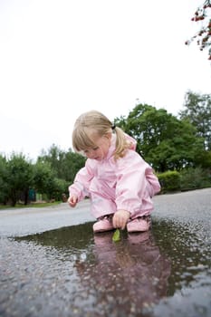 Baby Girl in a pool of water