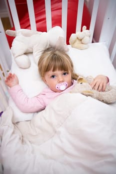Baby Girl in her bed