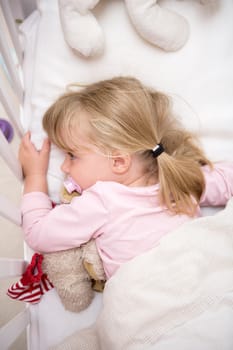 Baby Girl in her bed