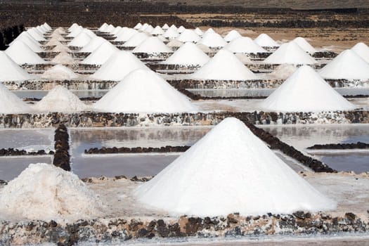 Salt piles on a saline exploration in Janubio, Lanzarote