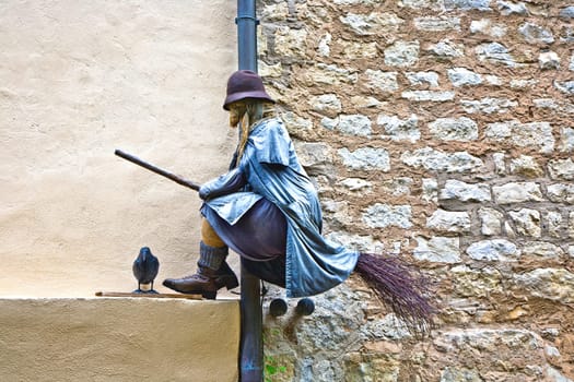 exhibition of old medieval witches and issues around superstition