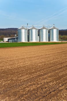 silo and acre in beautiful light with clear sky