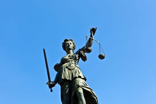 Statue of Lady Justice in front of the Romer in Frankfurt - Germany