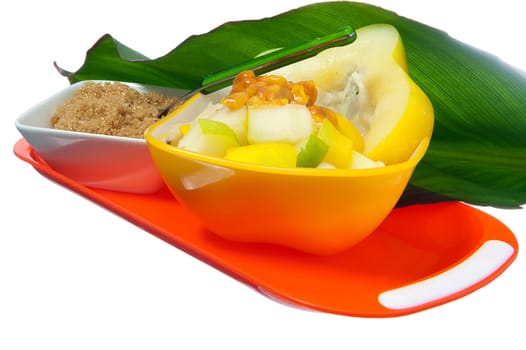 salad with tropical fruits on white background