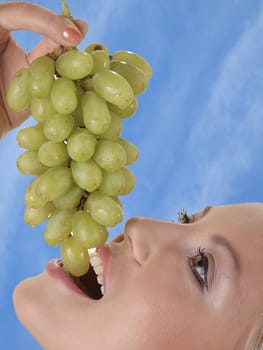 Woman with grapes