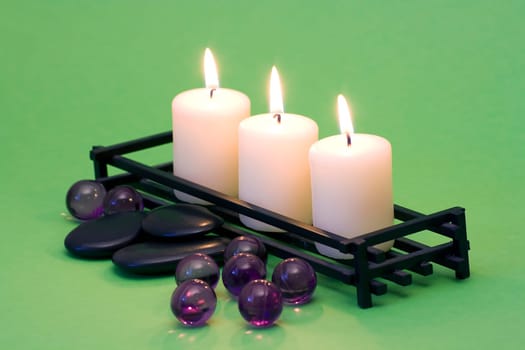 massage stone, oil bath pearls and candles
