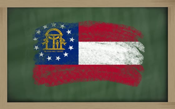 Chalky american state of georgia flag painted with color chalk on old blackboard