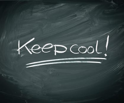 Keep cool, Handritten in chalk on a dirty grunge blackboard.