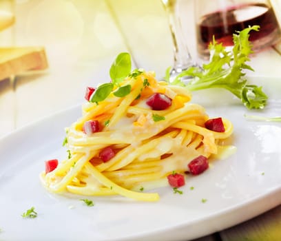 Serving Of Spaghetti Carbonara with ham, parmesan cheese for italian concept