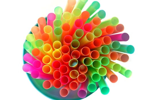 Colorful drinking straws on white background.
