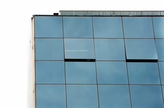 Office building glass facade and open windows. Modern architecture.