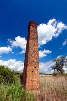Overgrown brick tower at Keepataw Forest Preserve of Illinois.