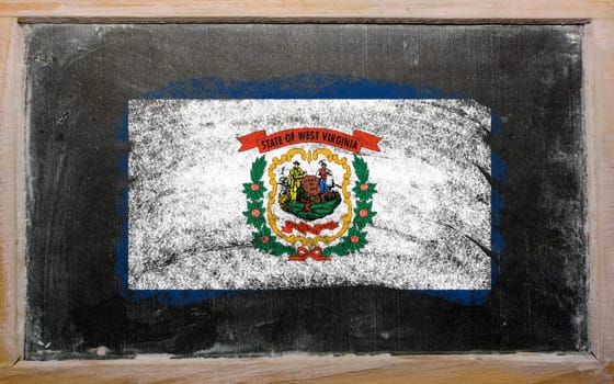 Chalky american state of west virginia flag painted with color chalk on old blackboard