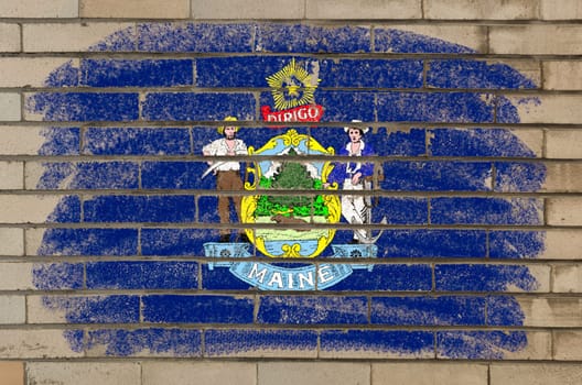 Chalky and grunge american state of maine flag painted with color chalk on brick wall