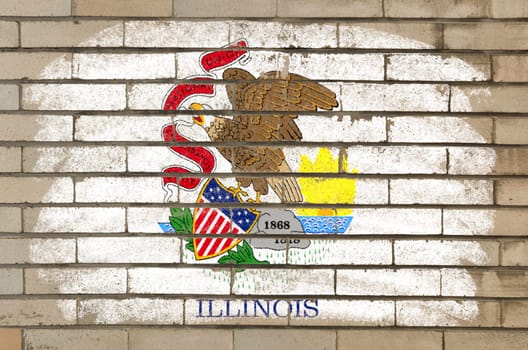 Chalky and grunge american state of illinois flag painted with color chalk on brick wall