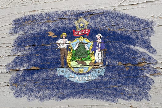 Chalky american state of maine flag precisely painted with color chalk on grunge wooden texture