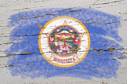Chalky american state of minnesota flag precisely painted with color chalk on grunge wooden texture