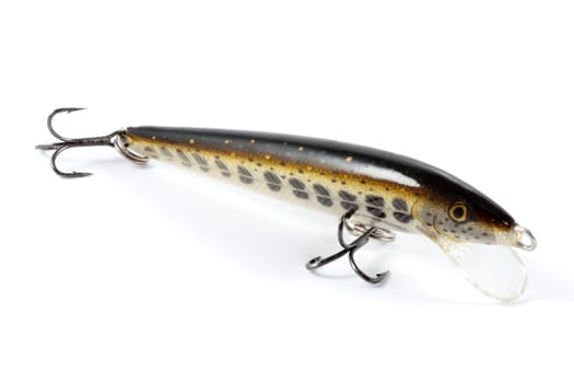 artificial imitation fish with hooks for fishing of predators on white background