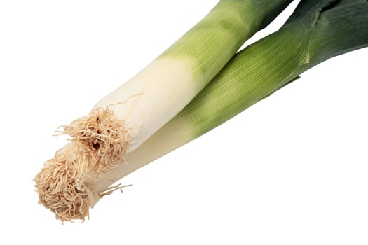 two fresh leeks cut on white background