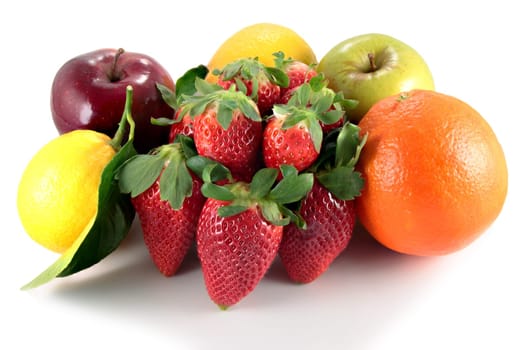 strawberries apples orange and lemons on white background