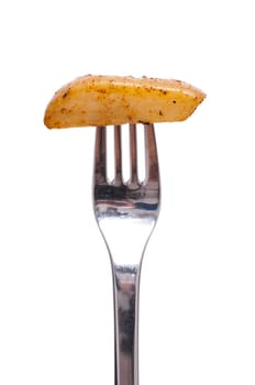 Spiced potato with fork isolated against a white background