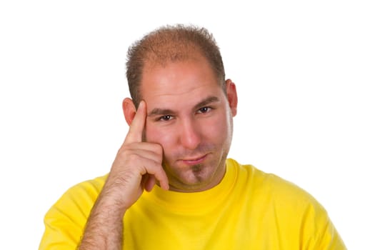 Young pensive man isolated on white background
