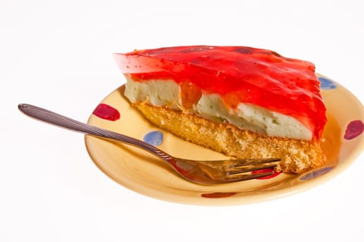 Dessert cake with jelly lying on the plate