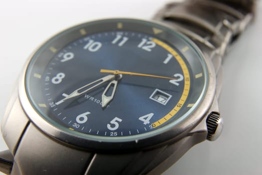 Mens stainless steel and cobalt blue dress wristwatch