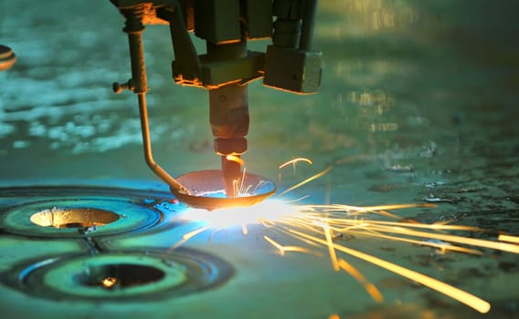 Laser cutting metal sheet