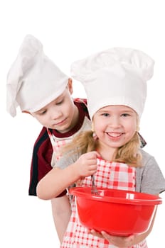 two children in chef&#039 s hat isolated on white background